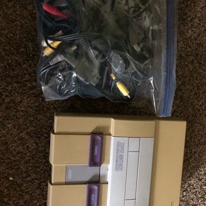 Nintendo with cords and two controllers